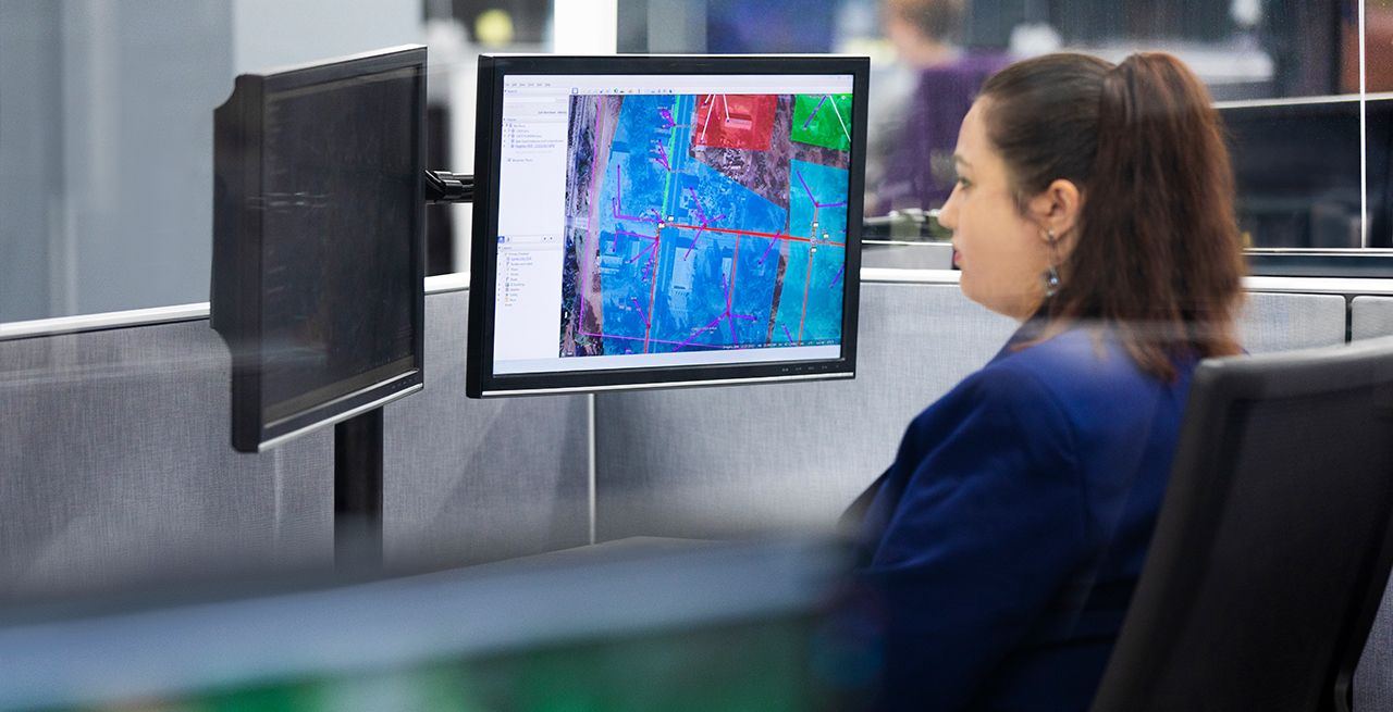 A Spectrum technician who works on the Centralized Design Team working in a central office